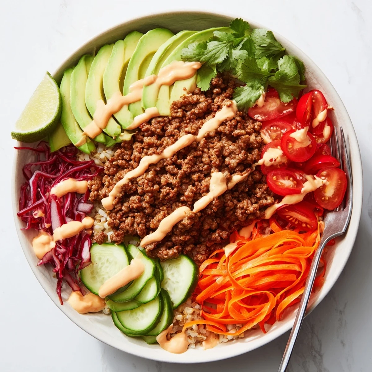Delicious plant-based meat bowl, featuring creamy avocado and crunchy vegetables.  