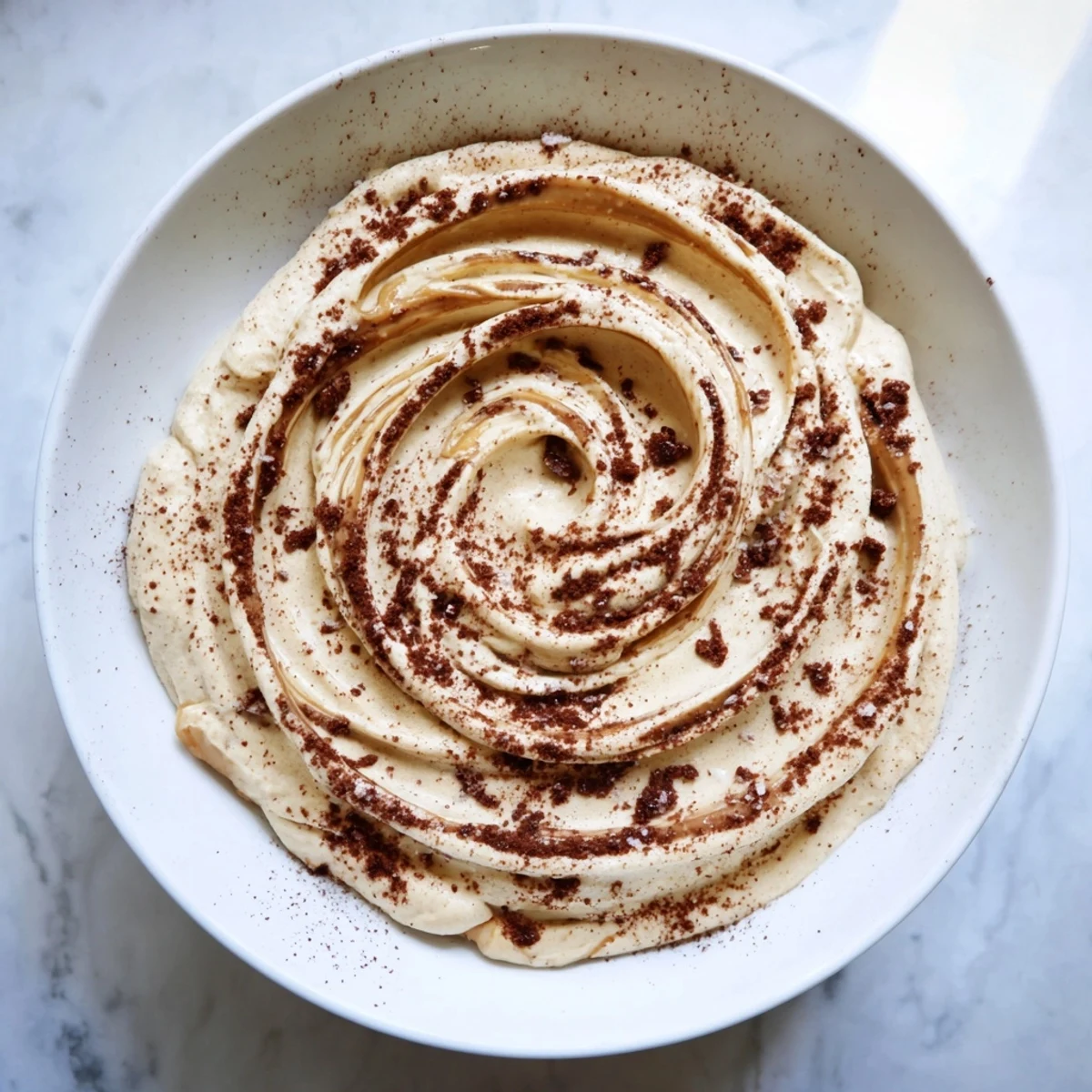 Creamy, swirled peanut butter banana ice cream, a naturally sweet and dairy-free frozen treat.