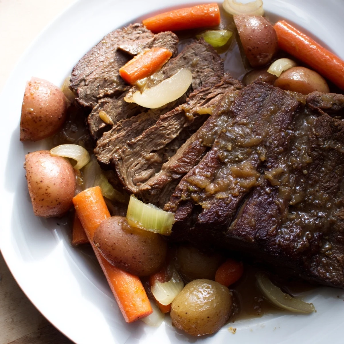 Hearty Pickle Brine Pot Roast served with carrots and potatoes, a comforting American classic for dinner.