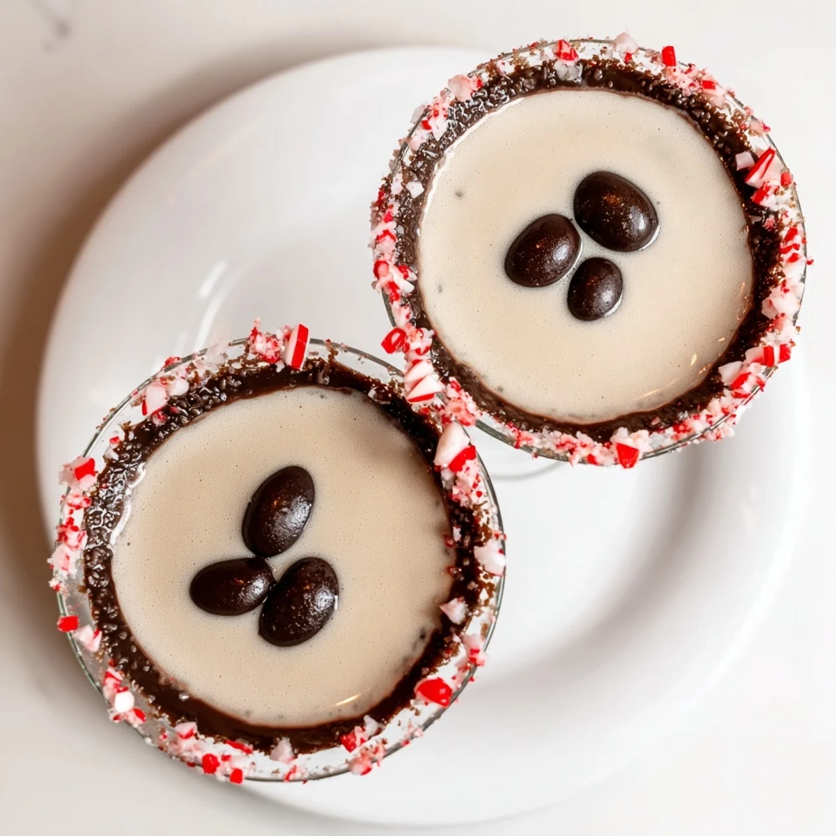 Frothy Peppermint Espresso Martini, garnished with espresso beans, a delightful holiday cocktail.