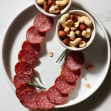 Delight in the seamless figure-eight "Infinity Loop," showcasing perfect salami and nutty pairings.