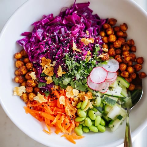 A colorful ASMR Crunch Snack Bowl filled with vibrant vegetables and crispy toppings.  