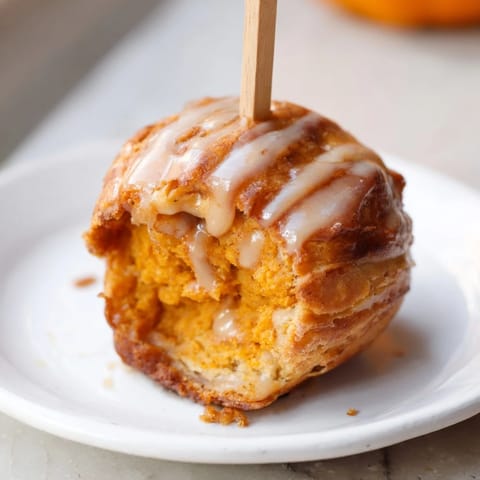 Tender pumpkin muffins infused with delightful sweet tea, perfect for fall gatherings.  