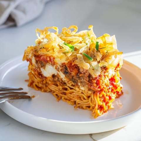 A comforting Spicy Ramen Lasagna bursting with flavors and aromatic spices.  