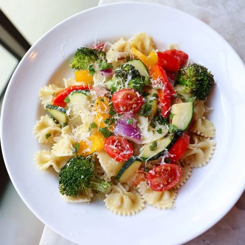 Golden-brown air-fried vegetables mingle with ditalini pasta in this flavorful vegetarian dish.